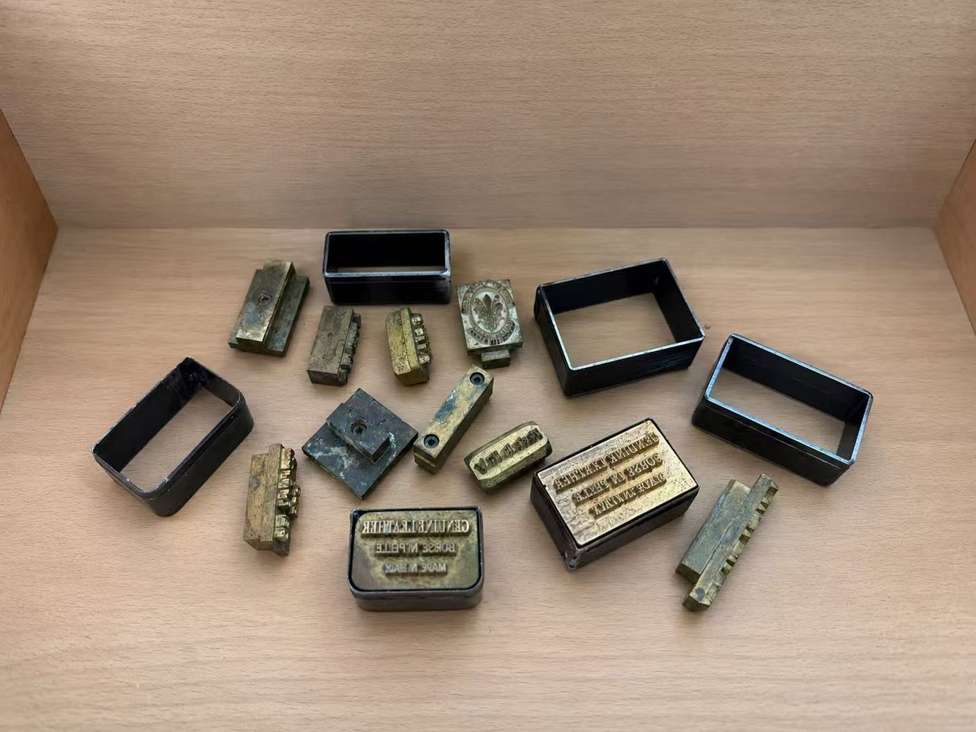 Brass and metal hardware components organised before assembly